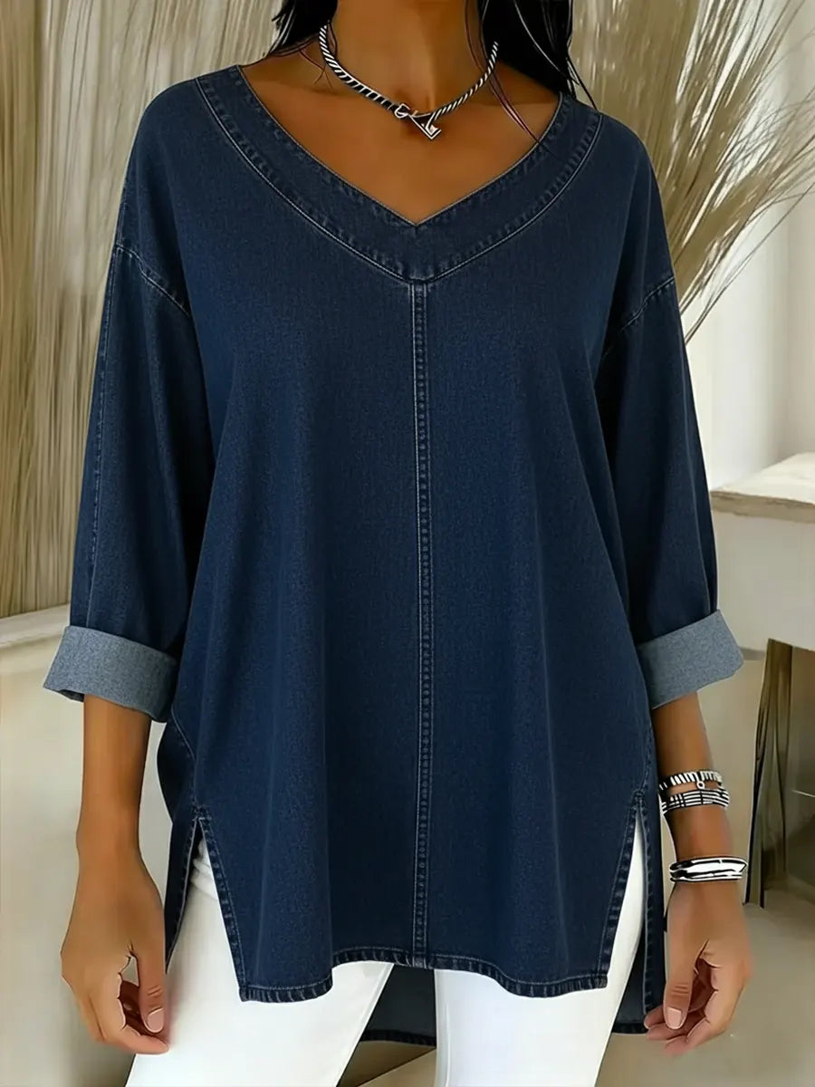 Relaxed fit women's denim tunic shirt, long sleeve. Easy casual top for everyday comfort and modern style.