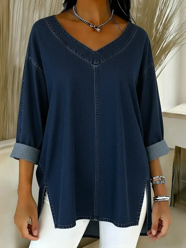 Relaxed fit women's denim tunic shirt, long sleeve. Easy casual top for everyday comfort and modern style.
