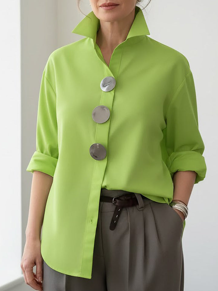 Women's fashion long sleeve blouse with large buttons, offering a relaxed fit and button-front style for comfort.