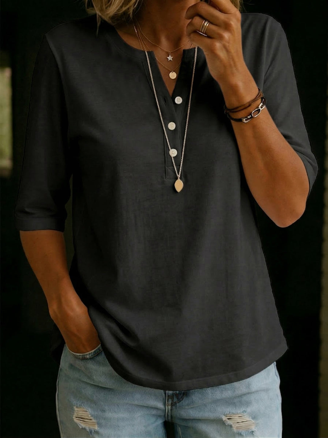 Stylish relaxed fit women's V-neck blouse with 3/4 sleeves, offering all-season comfort & easy styling.