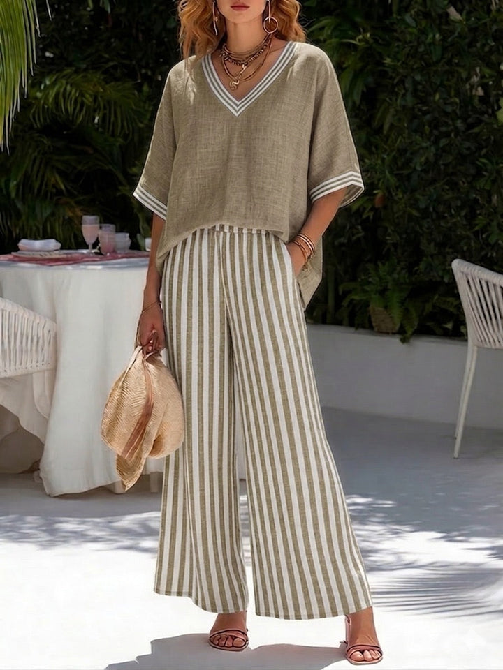 Detailed view of the striped wide-leg pants from women's V-neck top & pant set, showcasing casual fashion.