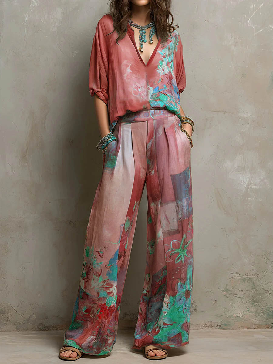 Chic women's floral wide-leg pant set. Features a stylish V-neck top and comfortable flowy wide-leg pants for resort wear.