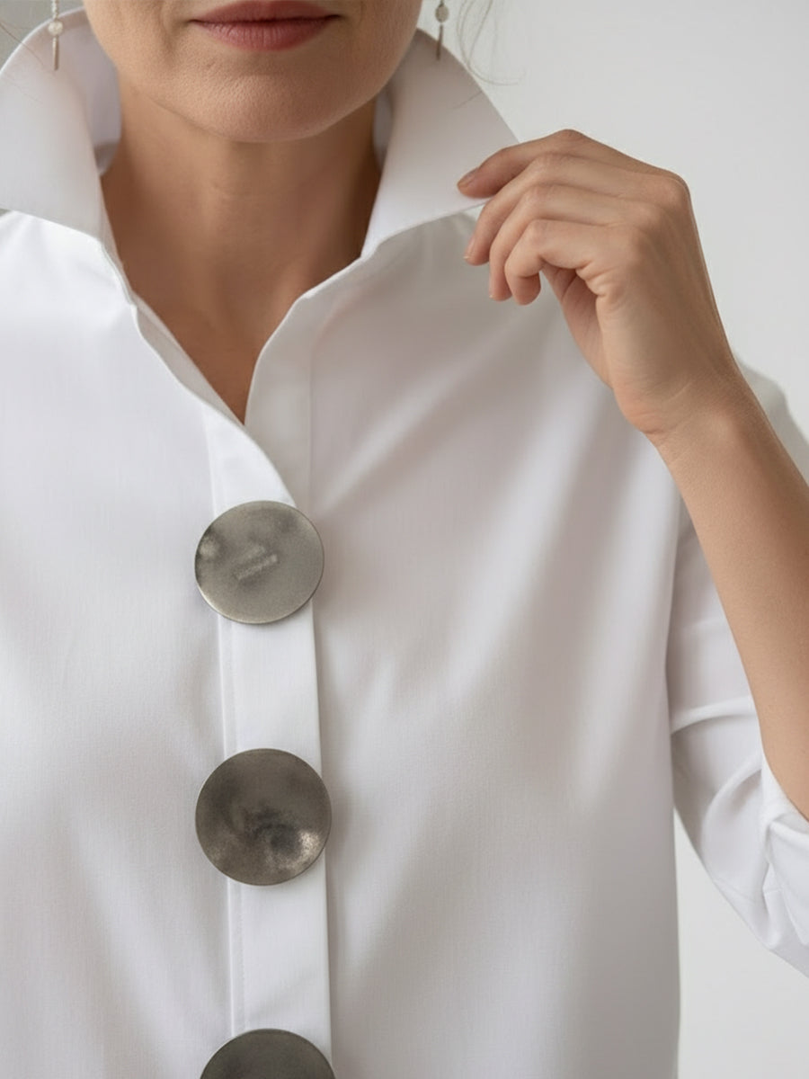 Casual women's long sleeve blouse with large buttons, ideal for comfortable everyday fashion and versatile styling.