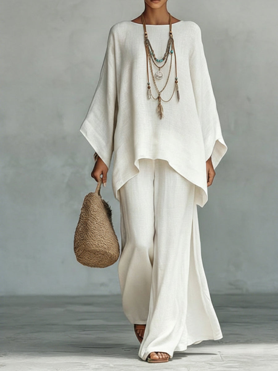 Elegant women's linen wide sleeve & trouser set. Chic two-piece outfit for summer fashion and casual wear.