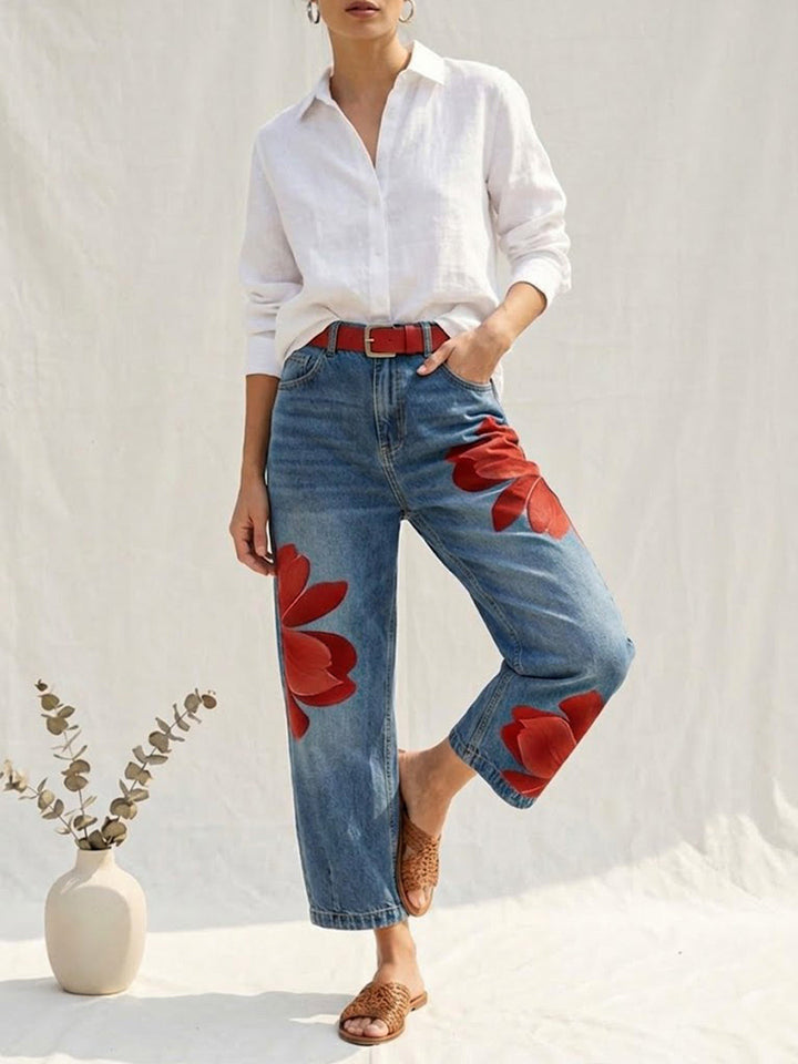 Casual women's straight leg trousers featuring a beautiful high-waisted floral print. Relaxed fit.