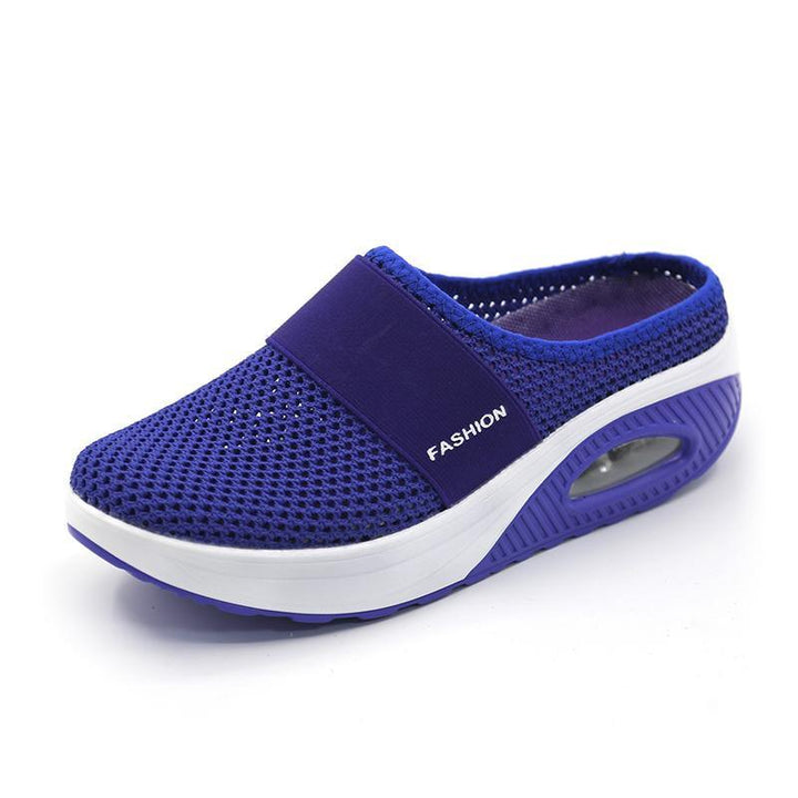 Durable women's walking slip-on shoes featuring air cushion technology & orthopedic support.