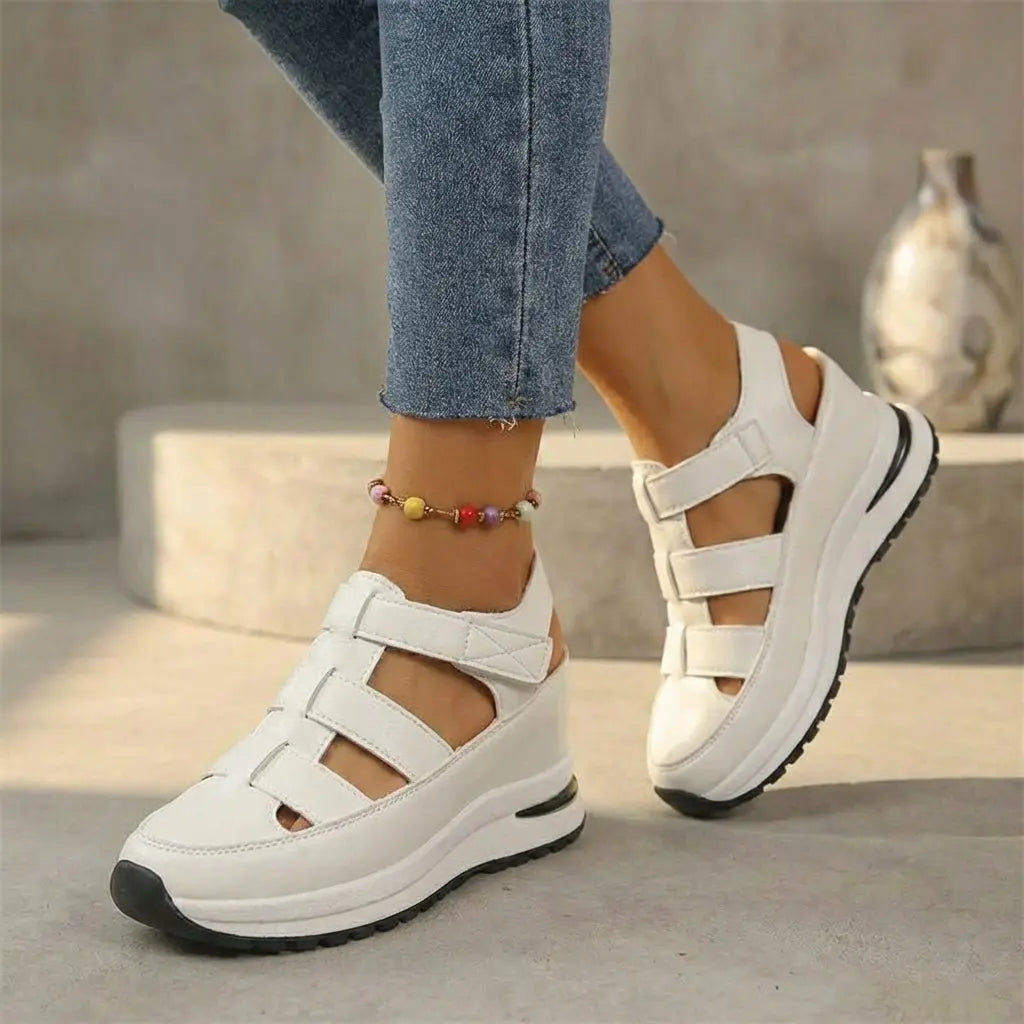 Stylish women's platform trainers, orthopedic, closed-toe with cutout details, ideal for autumn comfort.