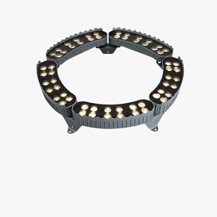 "Outdoor LED spotlights softly lighting tree bases with warm white glow, enhancing garden aesthetics with elegant aluminum de