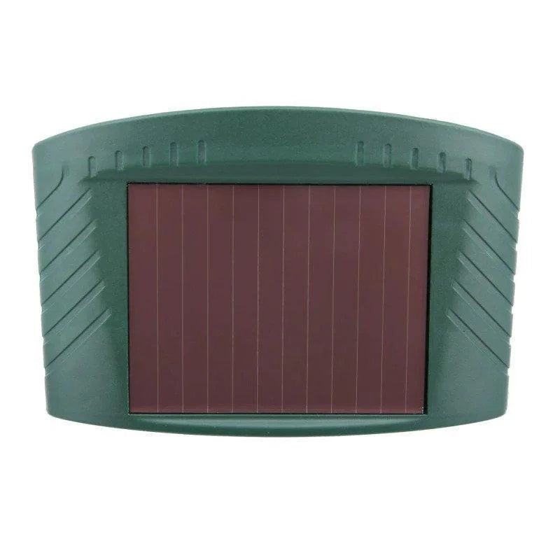 "Outdoor solar-powered ultrasonic deer repeller in garden setting, showcasing green and grey weather-resistant design."