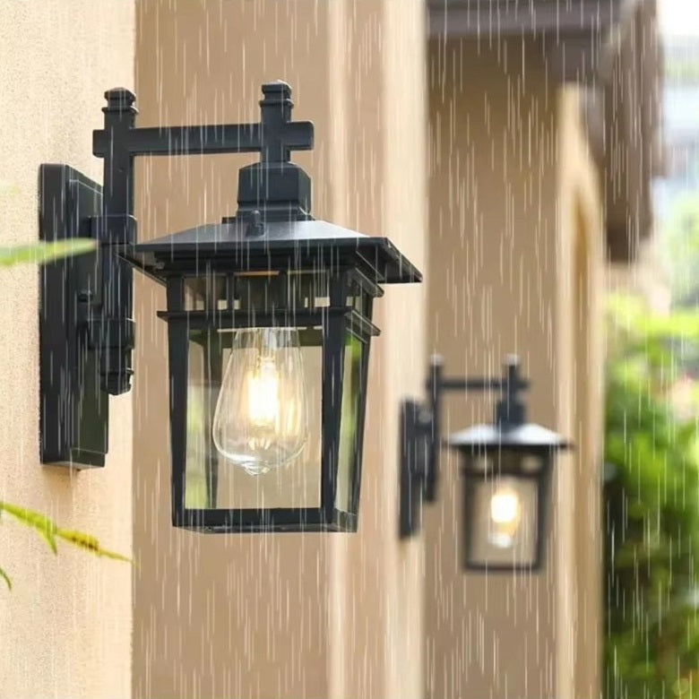 Durable aluminum outdoor lantern with E27 fixture. Perfect wall light for gardens & entrances.