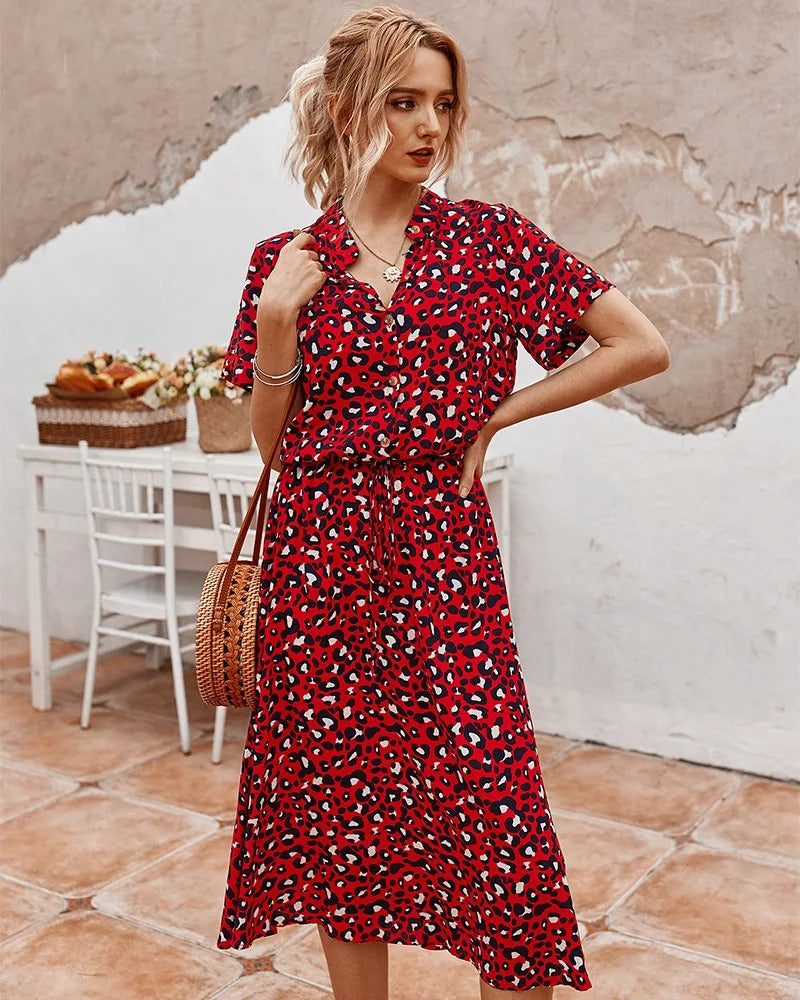 Flowy lightweight midi dress for women, an elegant short-sleeve summer and vacation essential.