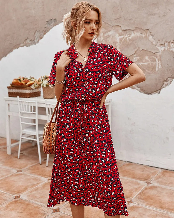 Flowy lightweight midi dress for women, an elegant short-sleeve summer and vacation essential.