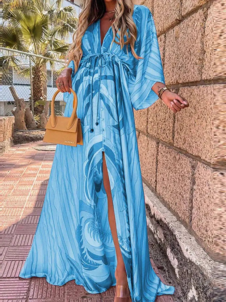 Women's deep V-neck abstract print maxi dress with flowing style, perfect for summer or holiday. Elegant and bohemian.