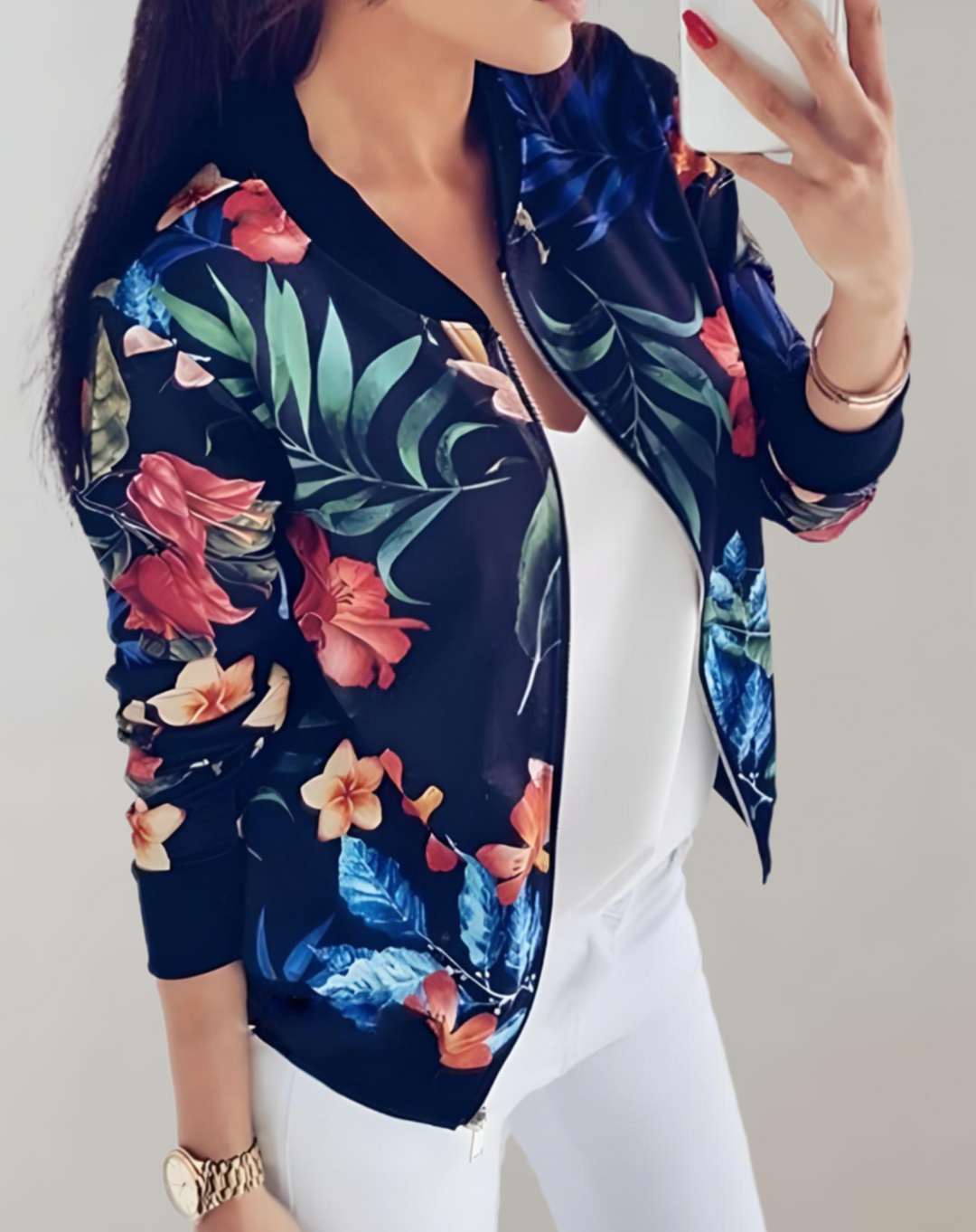 Comfortable women's lightweight floral bomber jacket. Chic vibrant print, ideal spring outerwear for a stylish casual look.