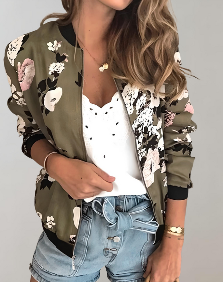 Fashionable women's floral bomber jacket. Perfect lightweight spring outerwear for a stylish and casual look.