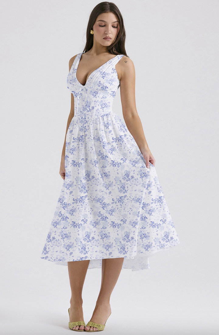 Beautiful floral summer midi dress for women, offering an elegant yet comfortable look for any occasion.