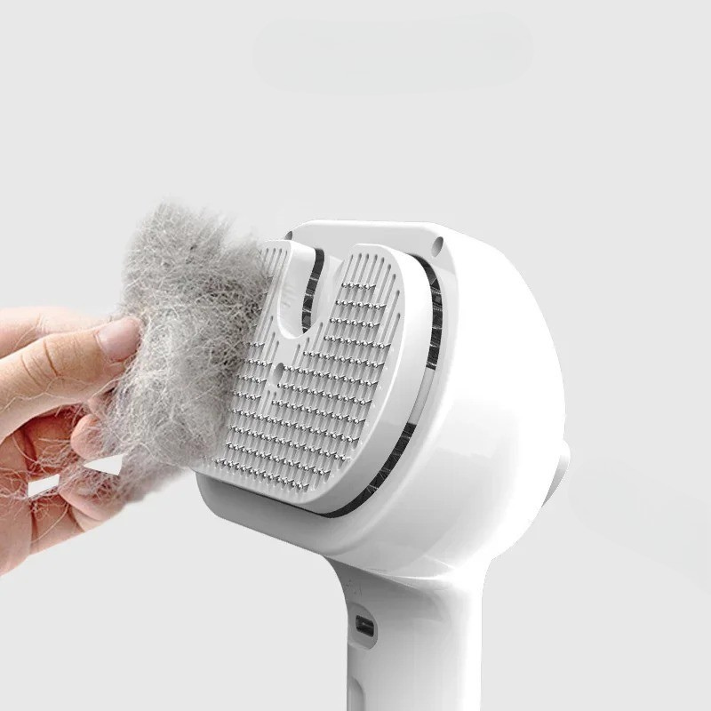 Pet grooming spray brush for dogs & cats, gently detangles & desheds fur, also helps with static control.