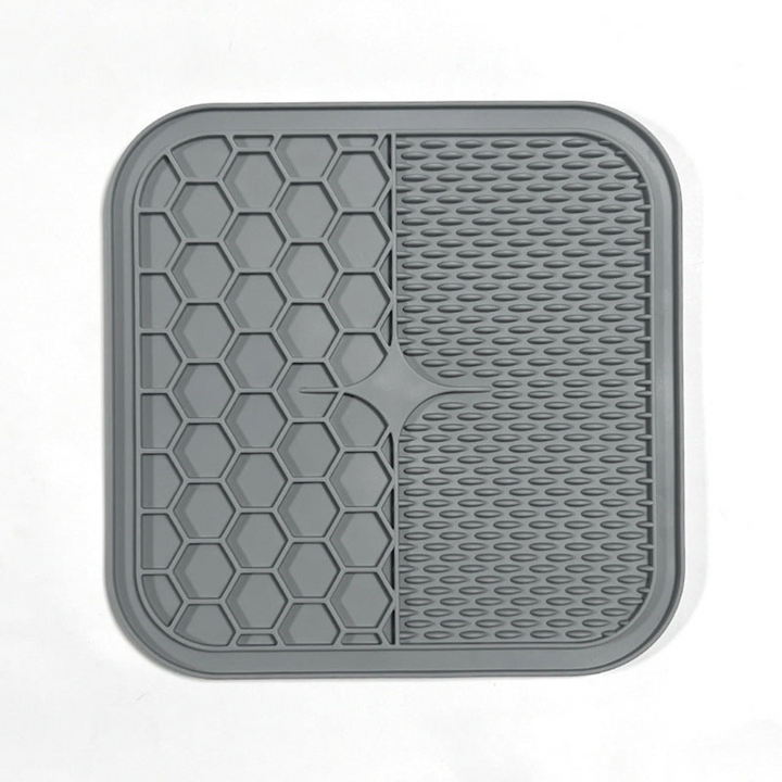 "Pet silicone lick mat in vibrant colors for stress relief and slow feeding; features textured surface for pets' wellness."