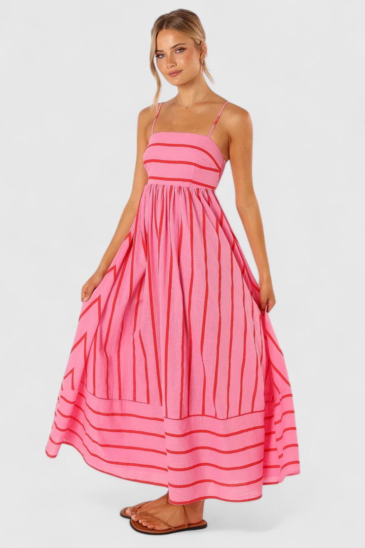 Beautiful pink flowy maxi dress for women, offering a comfortable and flattering elegant style.