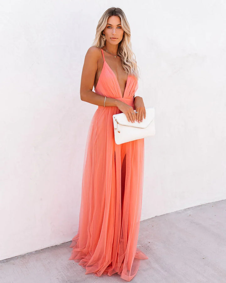 Women's coral light flowy maxi dress for elegant occasions, perfect for summer events.