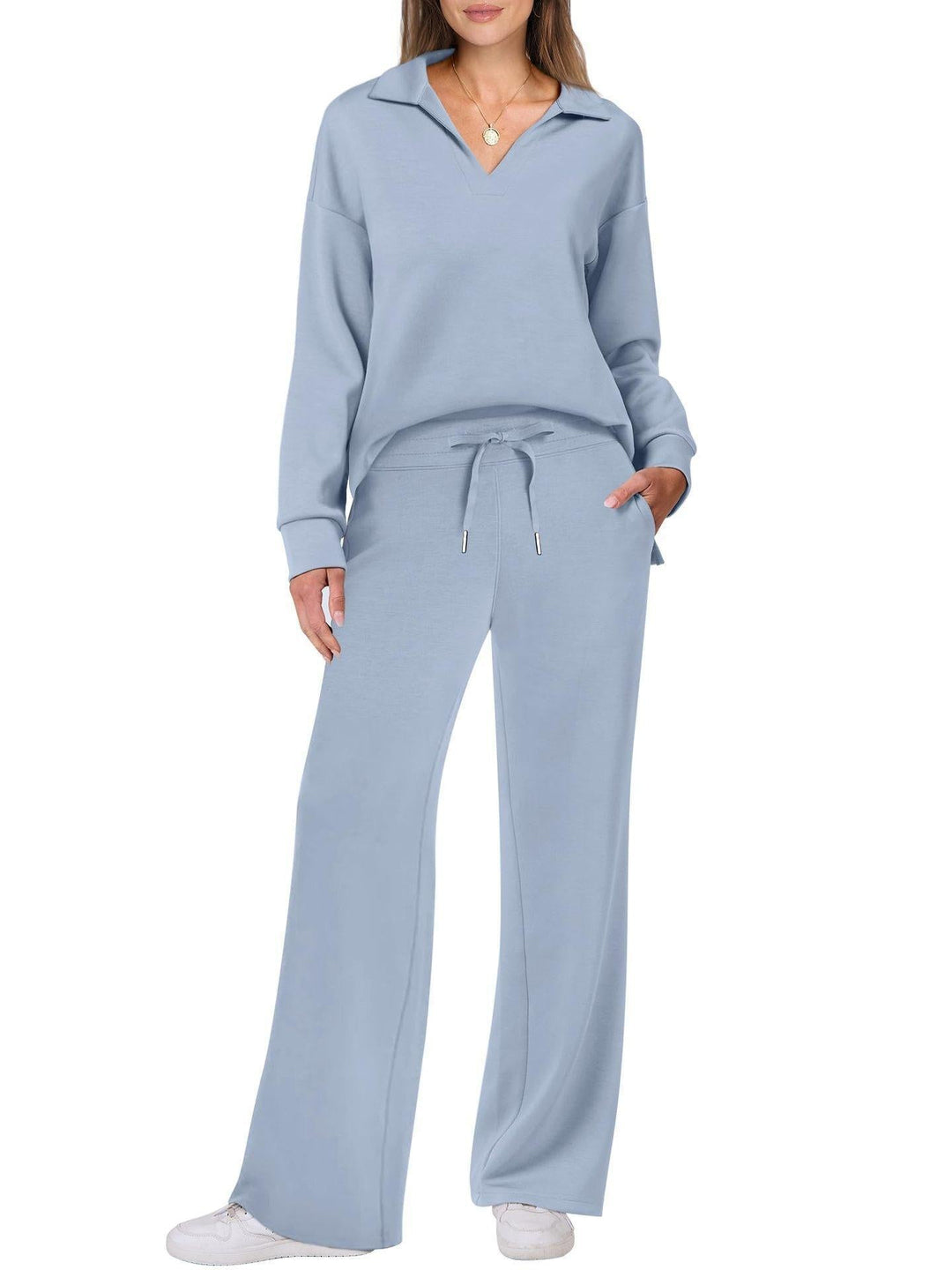 Relaxed fit women's two-piece V-neck long sleeve loungewear set with fashionable wide leg trousers.