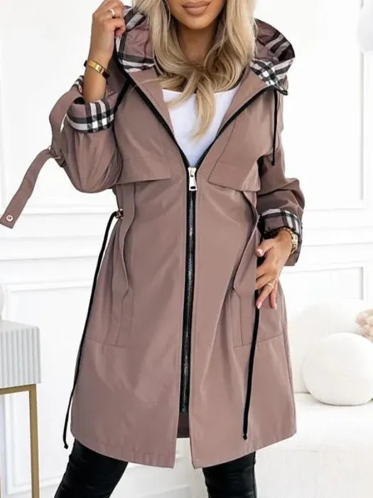 Women's waterproof & windproof zip coat in black, perfect for stylish winter protection & all-weather casual wear.