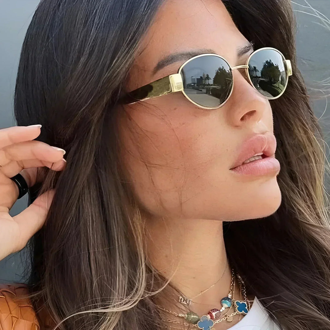 Stylish women's oval eyewear, a fashion accessory providing excellent UV protection and a chic look.