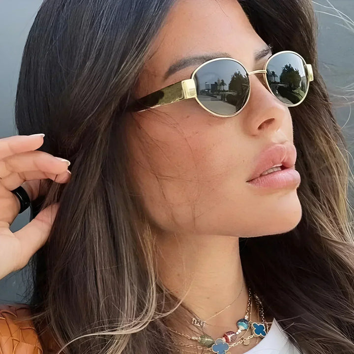 Stylish women's oval eyewear, a fashion accessory providing excellent UV protection and a chic look.