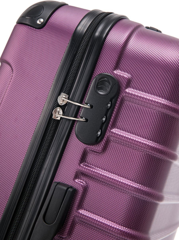 Complete 2-piece pink hardshell luggage set with spinner wheels, ideal for coordinated and efficient travel.