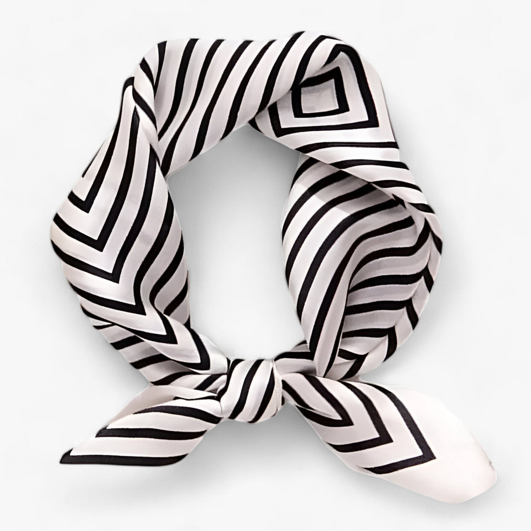 Women's versatile silk scarf. Elegant printed design, luxurious fashion accessory & perfect for gifting.