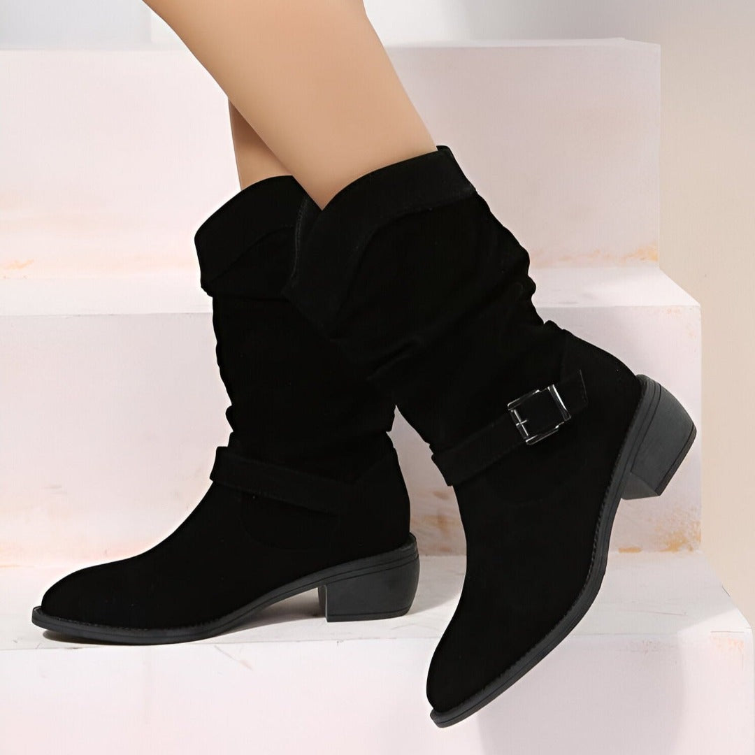 Stylish women's brown slip-on ankle boots, providing comfort & warmth for fall/winter everyday wear.