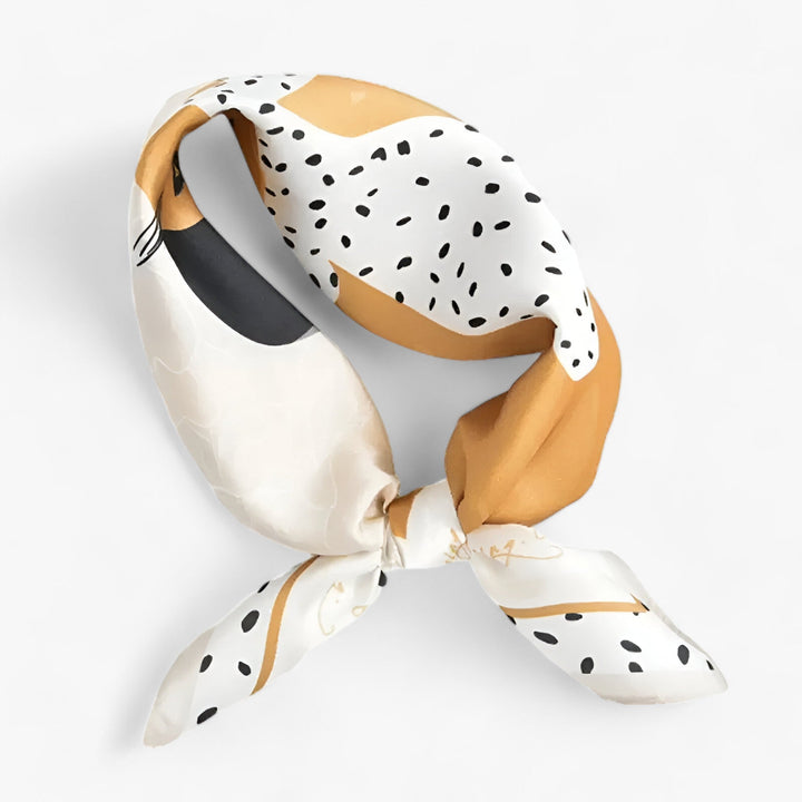 Fashionable women's silk scarf. Luxurious printed design, versatile elegant accessory & neckwear.