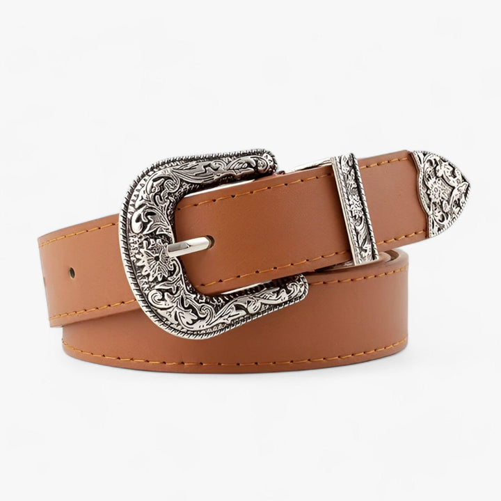 Durable women's vintage leather belt with western design. Stylish & long-lasting fashion accessory for any outfit.