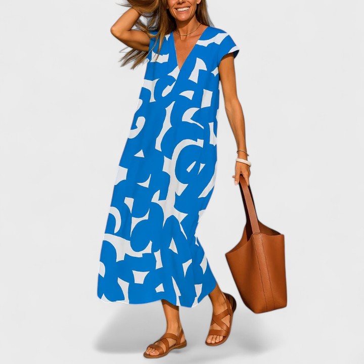 Sophisticated women's V-Neck Maxi Dress, a flowing design for elegant summer style, perfect as a versatile holiday outfit.