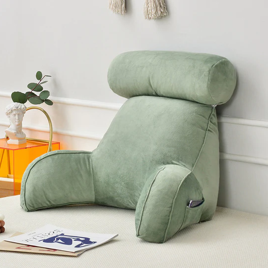 "Plush backrest pillow with arms, adjustable headrest, soft velour cover, ergonomic design for neck and back support."