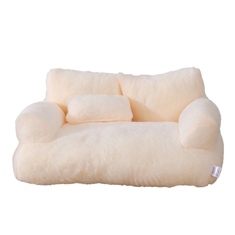 Cozy cat curled up in a plush, washable pet bed, offering luxurious comfort and anxiety relief.
