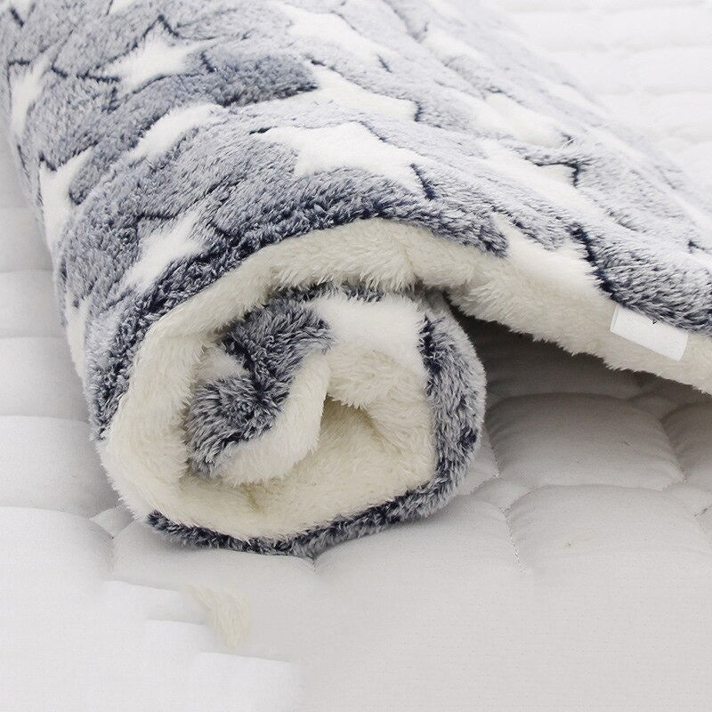 Calming pet blanket offers ultimate comfort & anxiety relief; protects furniture from pet hair.
