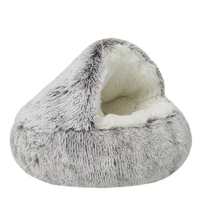 Warm, calming pet snuggle cave bed for furry friends. Plush, washable round design offers security for cats & small dogs.
