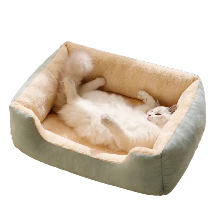 Soft grey plush dog bed for anxious small pets, offering cloud-like comfort & support.