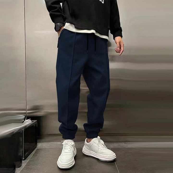 High-quality men's relaxed fit trousers, ensuring comfort and versatility for everyday fashion.