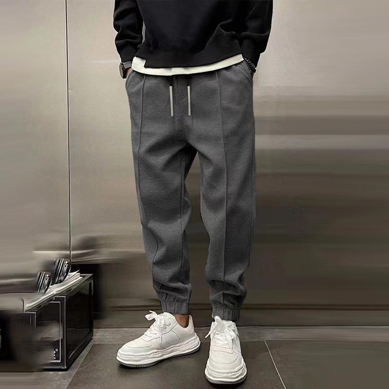 Flexible men's relaxed fit trousers, offering comfort and style for various casual occasions.