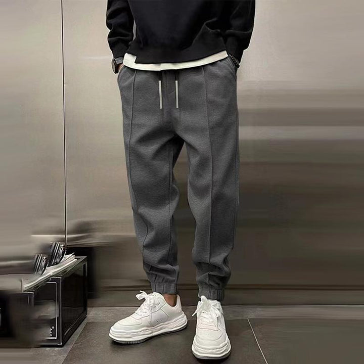 Flexible men's relaxed fit trousers, offering comfort and style for various casual occasions.