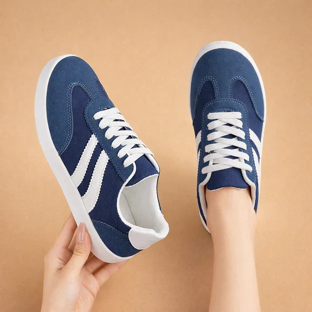 Stylish women's lace-up sneakers, lightweight and comfortable for active lifestyles.