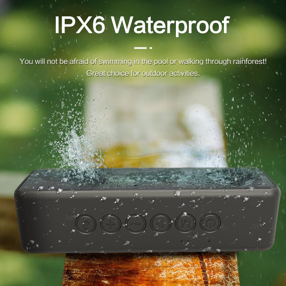 "Portable black waterproof 30W Bluetooth speaker with 4000mAh battery, dual drivers, compact for outdoor use."