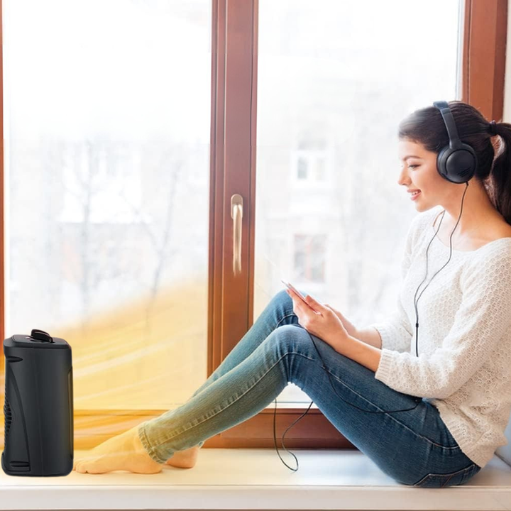 Efficient indoor portable electric heater with fan mode and multiple heat settings for cozy home comfort.