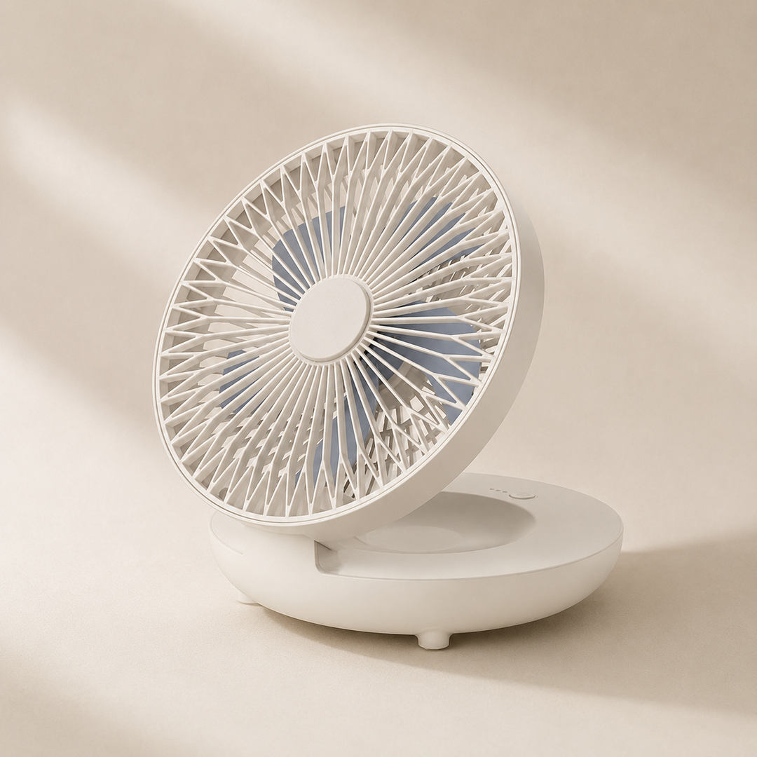 Portable handheld USB rechargeable fan for personal cooling.