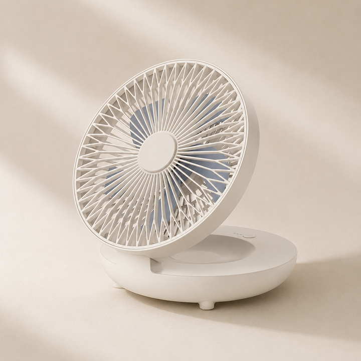 Portable handheld USB rechargeable fan for personal cooling.
