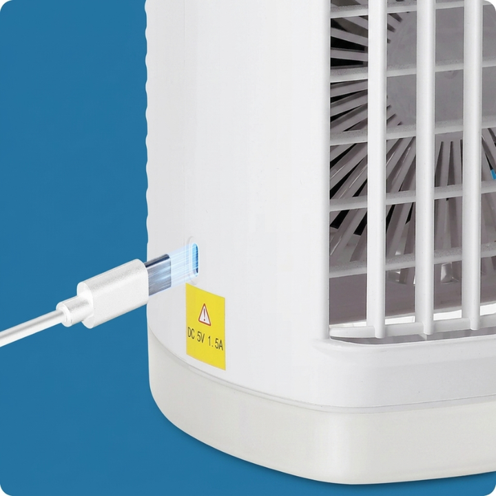 Compact USB personal mini air cooler for desk or home. Offers cool air, misting, and quiet operation.