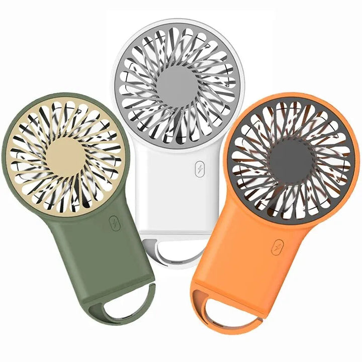 Green compact USB fan providing powerful air circulation for desktop, office, or camping. Multi-speed.