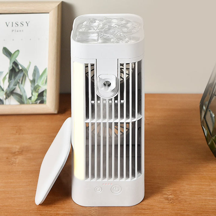 Desk fan with humidifier function, delivering a refreshing mist and cool air with convenient USB power.